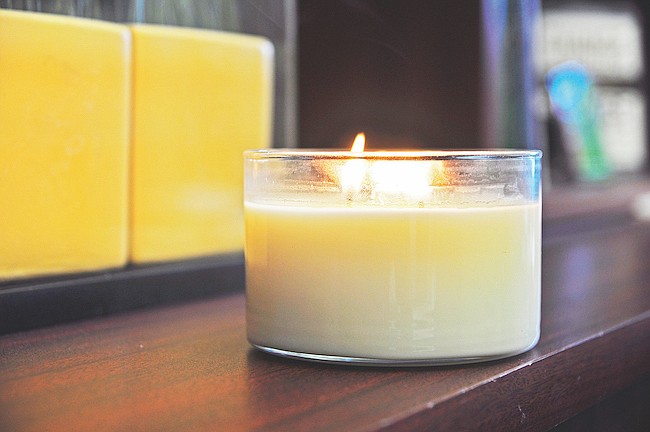 Photo by: Isaac Babcock - Candles and air fresheners can help cover odors in your home while also providing a more cozy feel, but for a truly welcoming home it's best to start with a clean slate and add inviting scents on top.