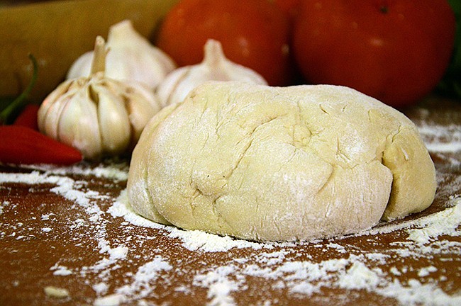 Photo: Courtesy of freeimages.com - If this is your first time making pizza dough, you might be surprised how easy it is to make using instant yeast and common items.