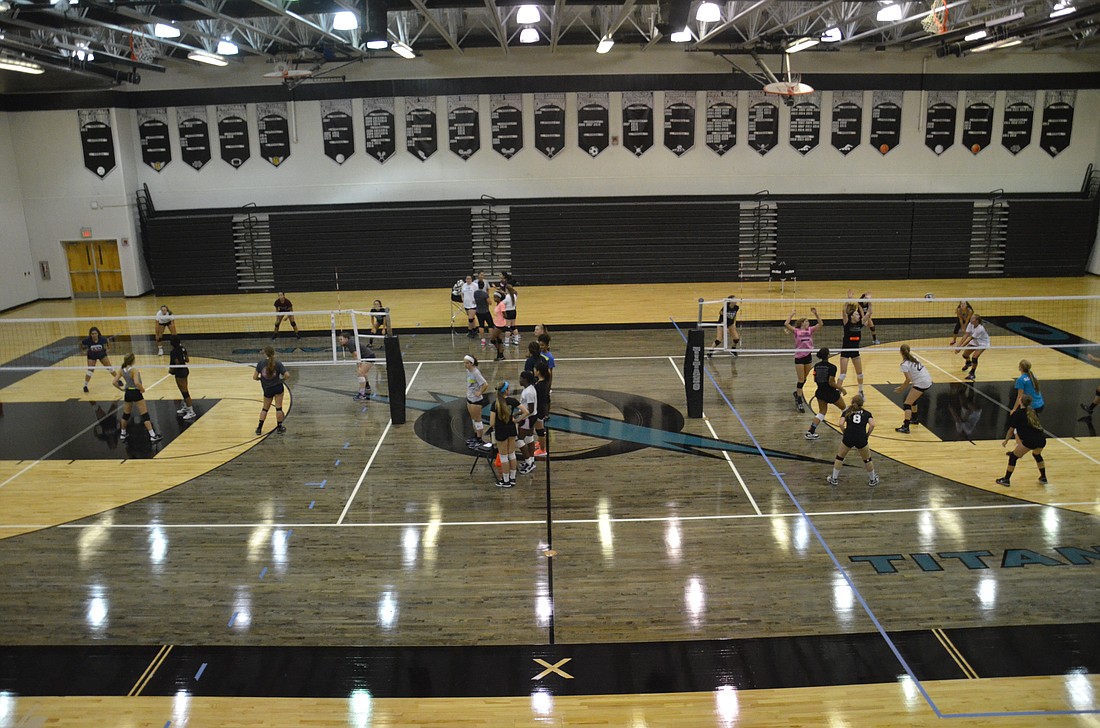 The varsity volleyball team at Olympia High held tryouts Aug. 1, marking the first official practice on the resurfaced gym floor.