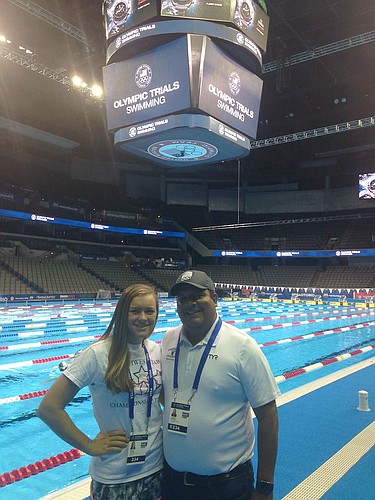 SouthWest Aquaticsâ€™ Katie Schorr with coach Justin Correia at CenturyLink Center in Omaha, Neb. â€” site of the U.S. Olympia Trials for swimming.