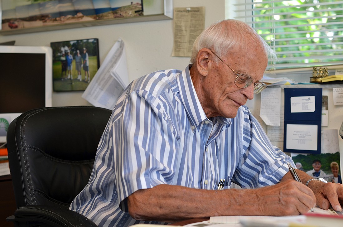 Weldon  Frost, 84, writes and taps out letters to the editor on his keyboard to the Longboat Observer when he feels important issues need to be addressed.