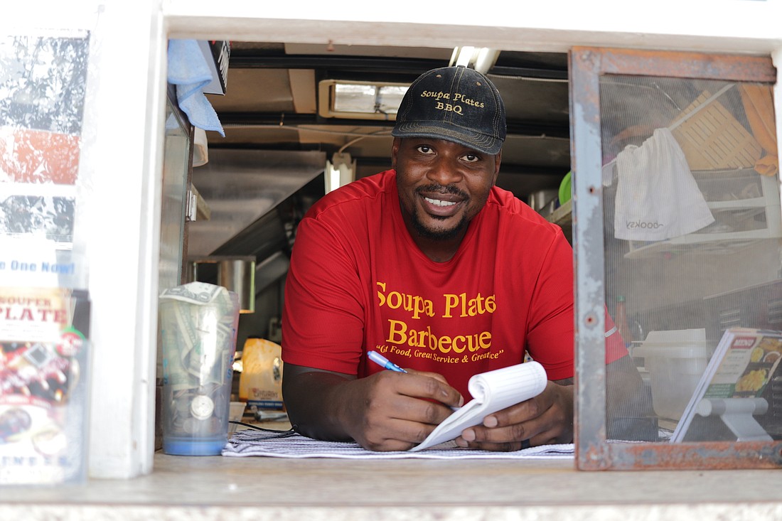 Carl Romain has been a private caterer for about 30 years and has been operating his roadside eatery, Soupa Plates, for about 3 years.