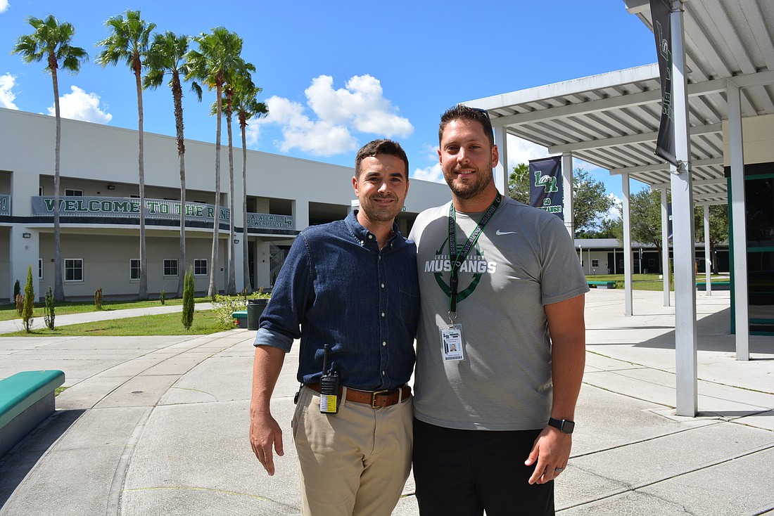 Lakewood Ranch High School Dean Thomas Bellantonio and Lakewood Ranch High School teacher Tommy Cuervo enjoy getting students excited about their school.