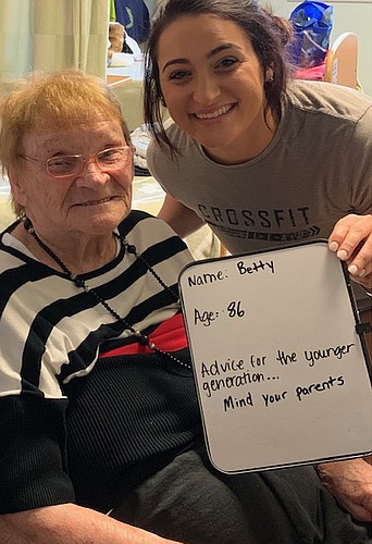 Elana Gold, right, visited with Betty Robertson at Quality Health Care Center. Gold posted a photo of them on her Facebook page, and one of her friends recognized Robertson as the "lunchroom lady" from her elementary school.