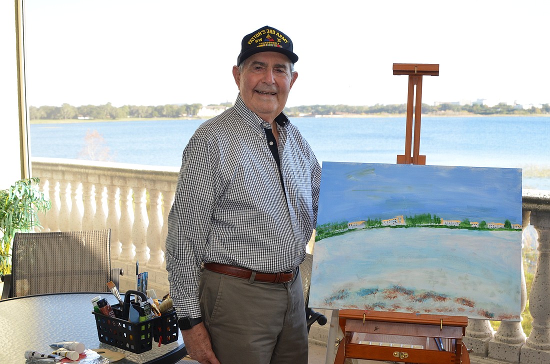 Gilbert Waganheim keeps his mind sharp by walking a mile every day and painting pictures, including the scene from the balcony of his Dr. Phillips condo.