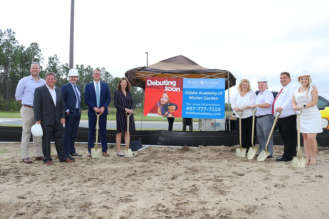Kiddie Academy hosted its groundbreaking on Nov. 6. From left: Kevin Merideth, Craig Pincince, Grant Gary, Erich Maschhoff, Vanessa Siefcak, Linda Collins, Bill Collins, Mark Allen and Ashley Collins. (Courtesy photo)