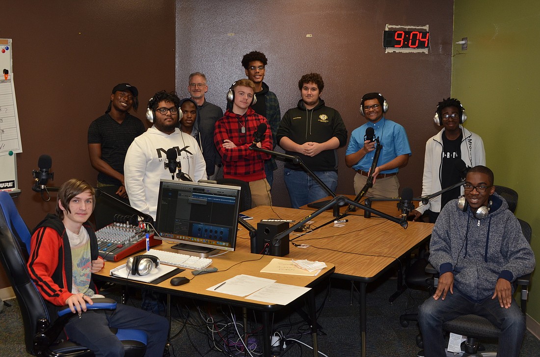 The podcast class, led by Jeffrey Gallup, fifth from left: Leo Weber, Theodule Smith, Jonathan Ramjattan, a guest student, Zachary Ringer, Jackson Forges, Jacob Smith, Trenton Johnson, Cleveland Payne and Jahmell Blaise.