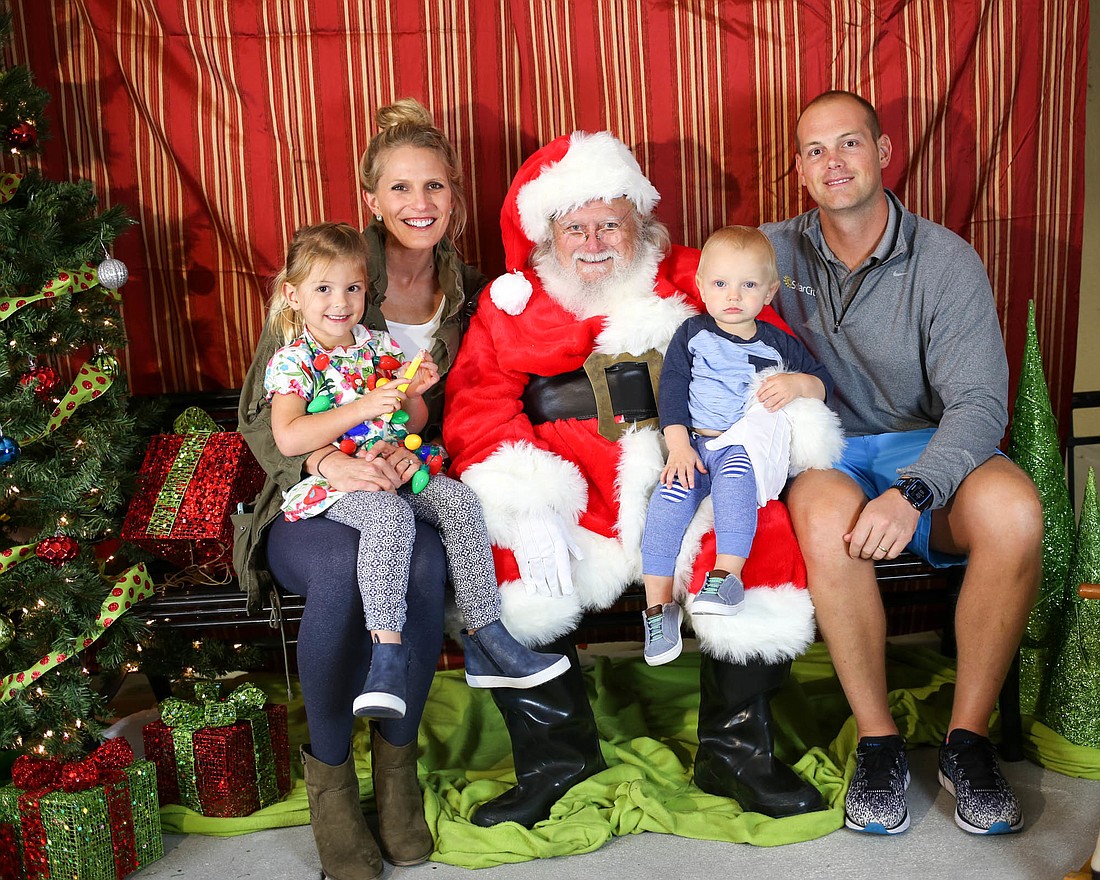 Families can have their photos taken with Santa Claus for free during Light Up Baldwin Park. (Courtesy Baldwin Park Events)