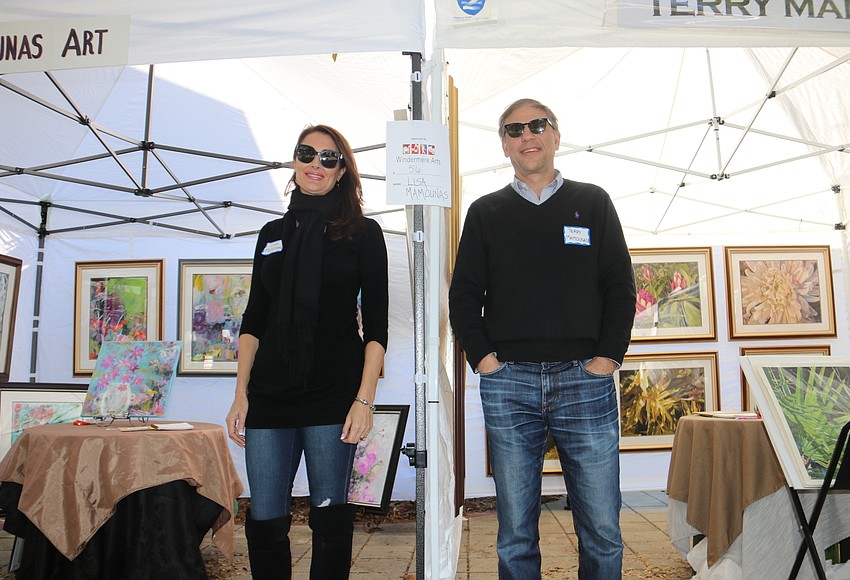 West Orange Times & Observer Photo Husbandandwife painters Lisa and Dr. Terry Mamounas set