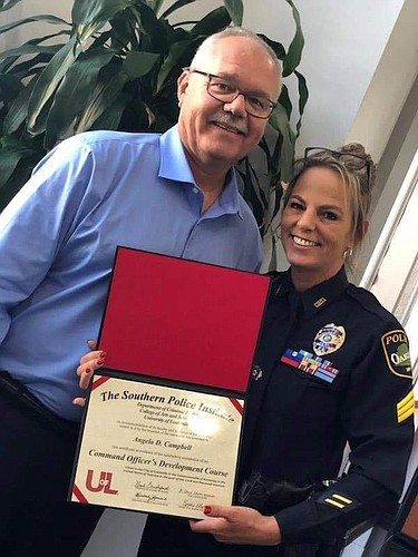 Angela Campbell celebrated her graduation from The Southern Police Institute.