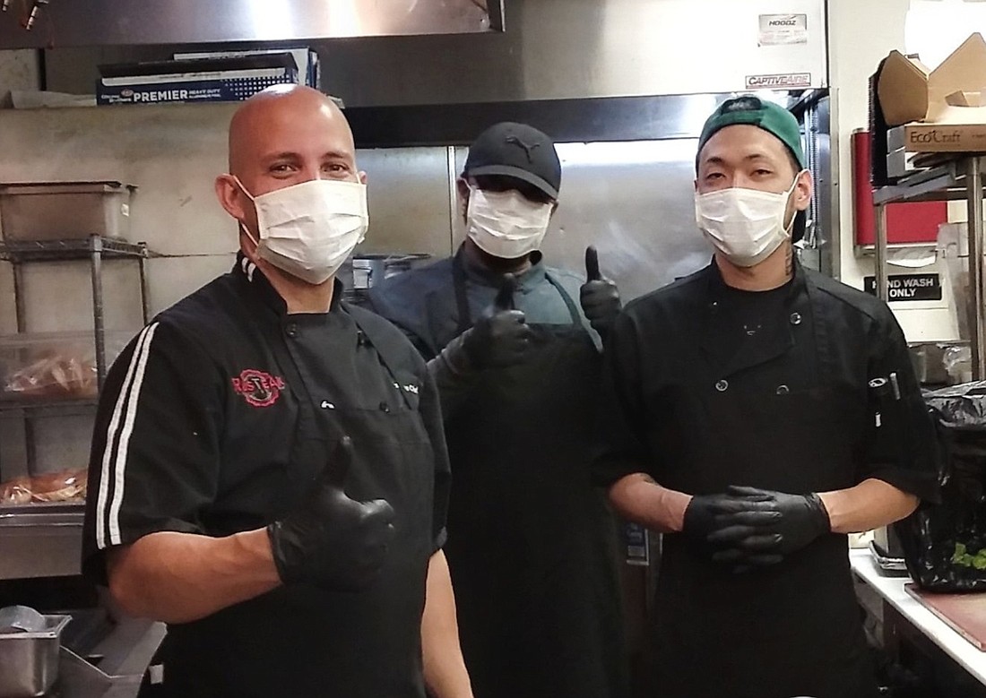 RusTeak chefs donned personal protective equipment to adjust to the times.