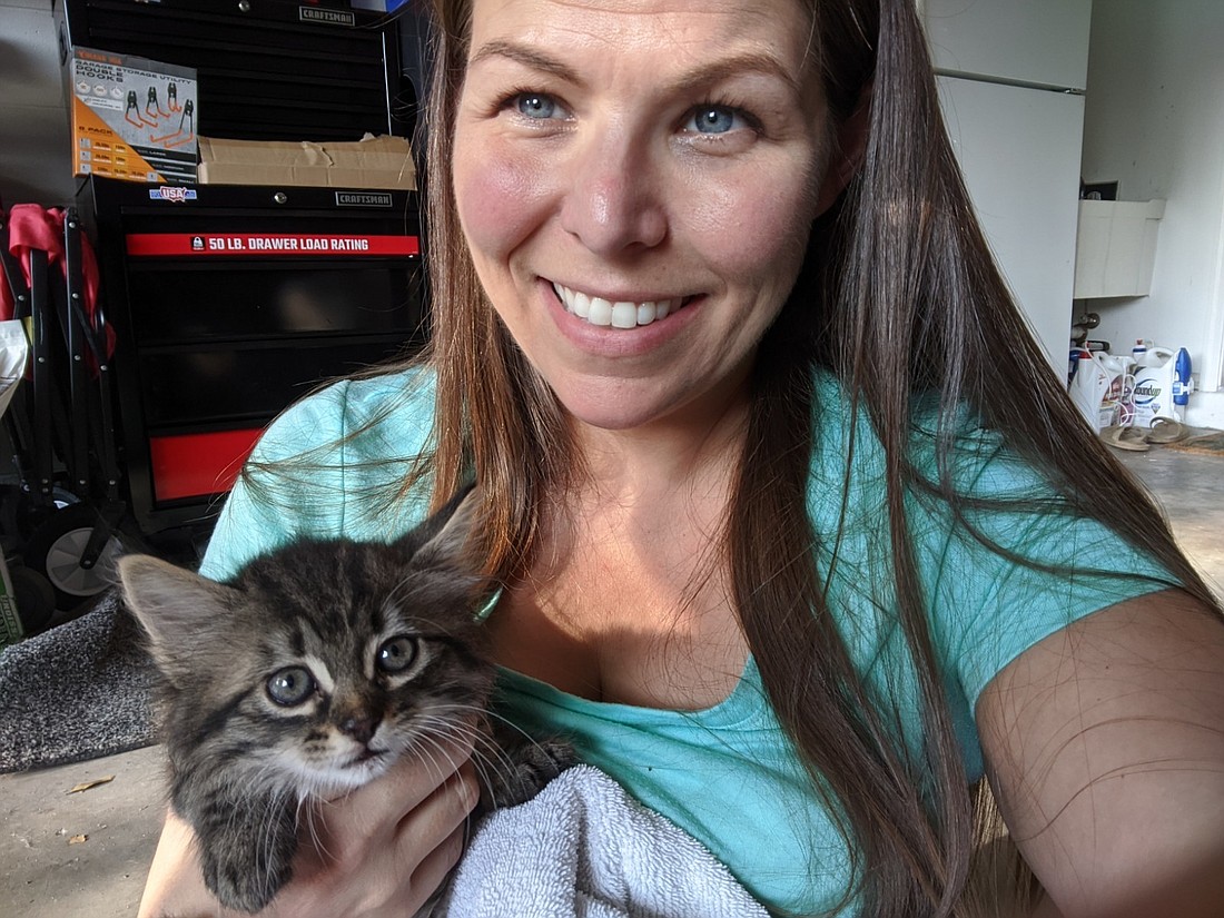 Homeowner Jo Charles immediately took the kitten inside and gave it a bath.