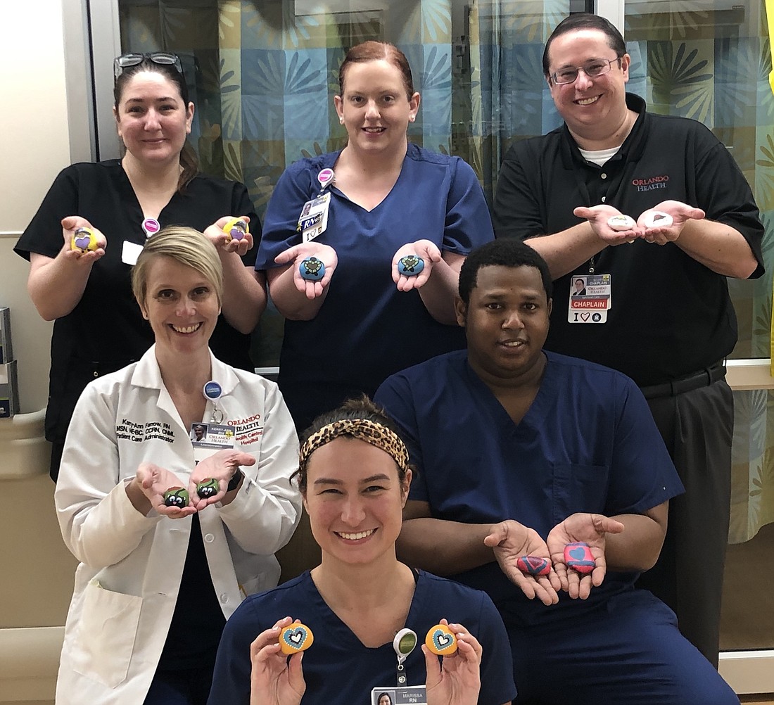 (Courtesy photo) Orlando Health team members love being able to provide patients and families with a sense of connection through the Two Hearts Program.