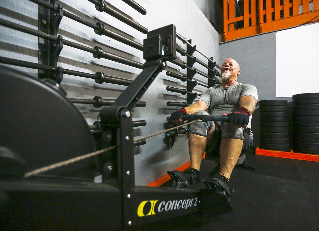 Brent Couch got in some time on a rowing machine during an early-afternoon workout.