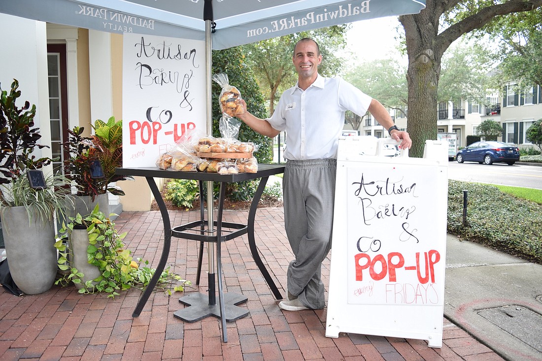  Luis Morales holds his pop-up bakeries each Friday outside a business in the Village Center. Here, he is outside Baldwin Park Realty.