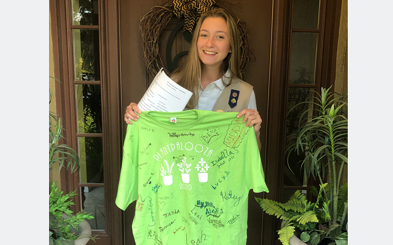 Amelia Sauls had campers sign a Plant Palooza T-shirt during her event.  (Courtesy)