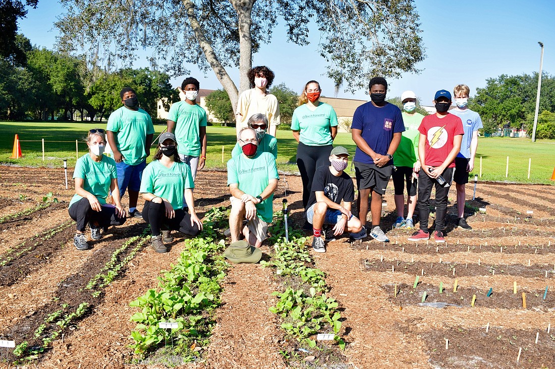 Volunteers from St. Lukeâ€™s United Methodist Church partner with Grow Orlando and youth farmers from east Winter Garden to tend to their micro-farm each week.