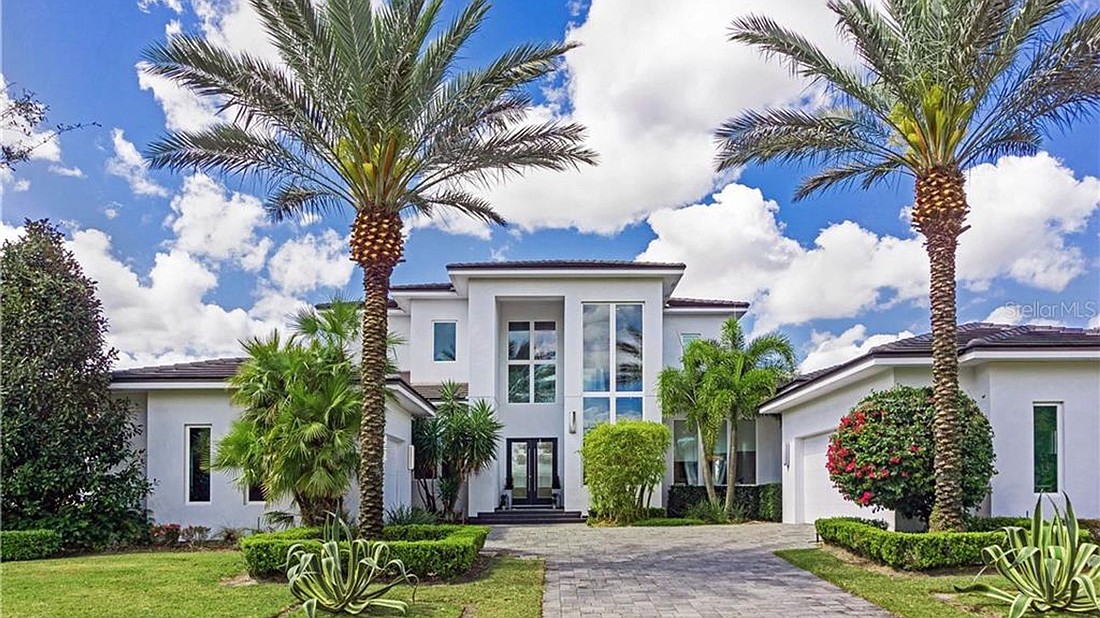 The home at 11712 Vinci Drive, Windermere, sold May 28, for $2.1 million. The open-floor concept features marble glass floor throughout the living room and a view of the Lake Butler.Â greaterorlandorealestate.com
