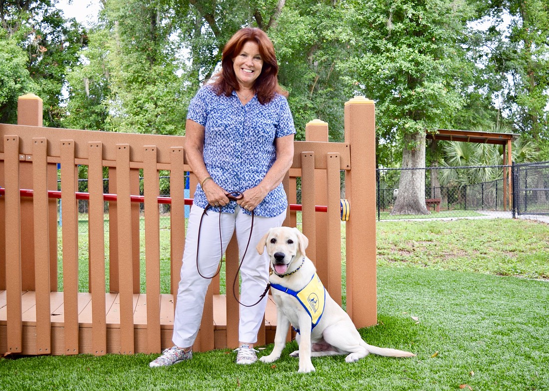 Winter Garden resident Robin Walker is raising 5-month-old Walt for Canine Companions for Independence.