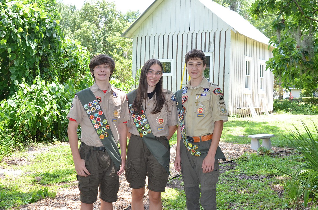 Three of the four Matteson children are working at the 1887 Schoolhouse in Windermere to earn their Eagle Scout rank: Peter, left, Janine and Alexander.