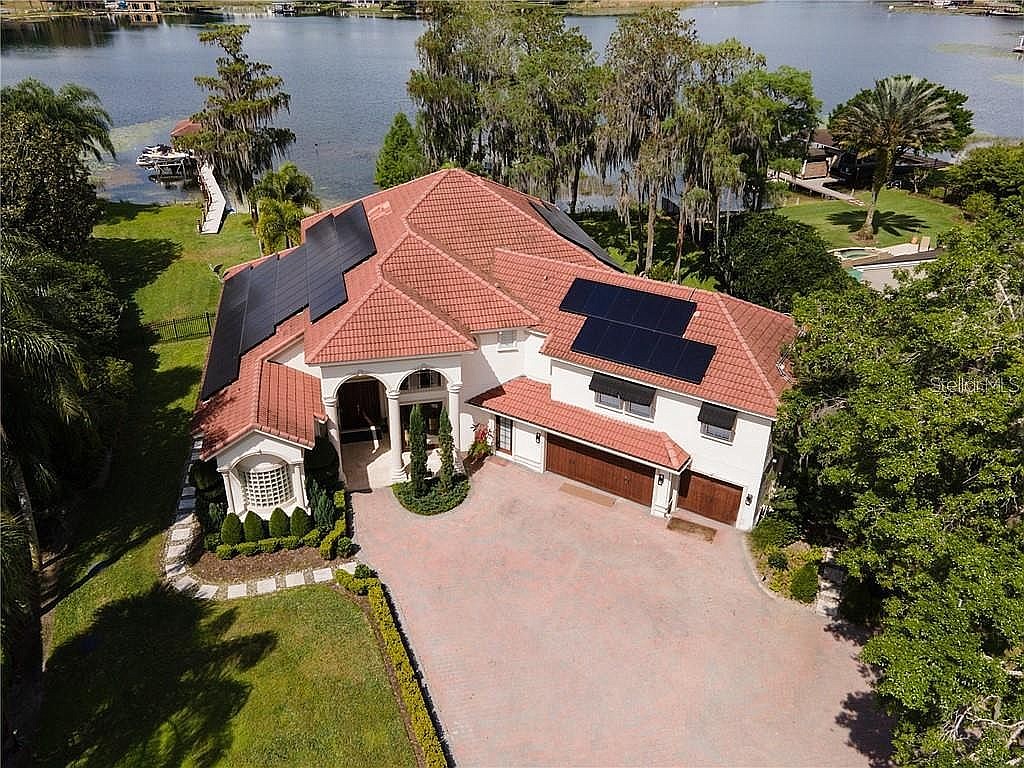 The home at 20 Main St., Windermere, sold Aug. 20, for $2.45 million. This resort-style home features 200 feet of lake frontage on Wauseon Bay has its own sand private beach.Â zillow.com