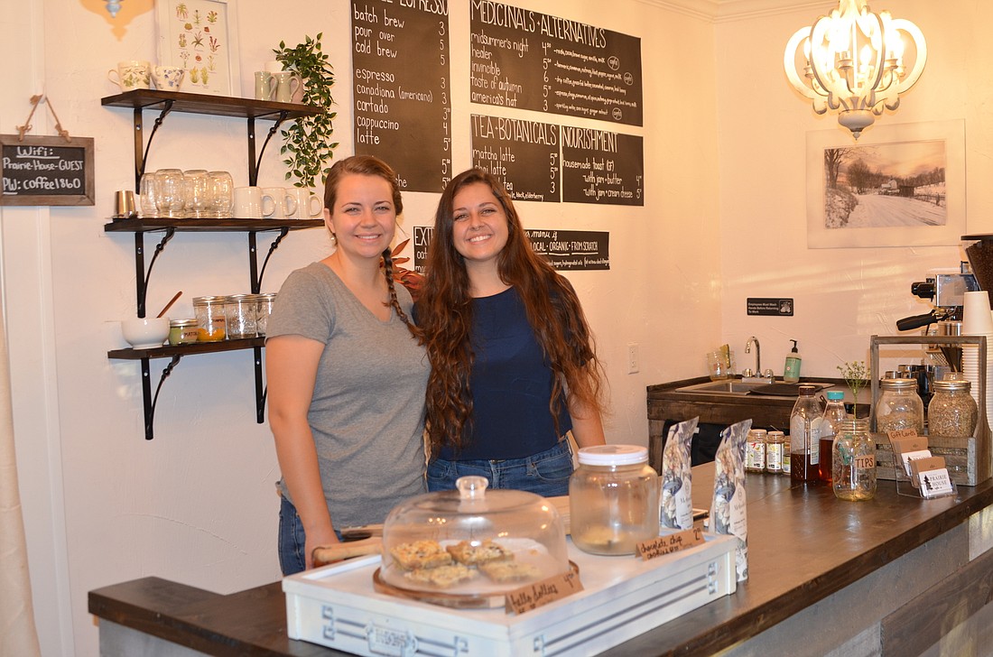 Alexa Maisonet, left, and Jade Dinsdale serve coffee and light bites from the oldest building in Oakland.