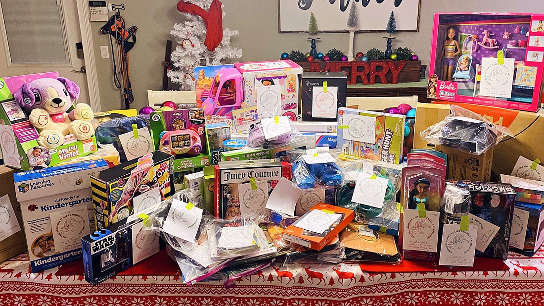 A portion to the gift donations for the Orange/Seminole Foster Children&#39;s Association angel tag tree.