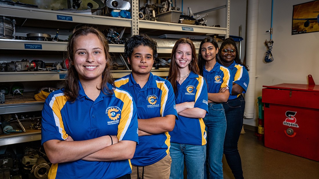 Shelby Quillinan, center, of Winter Garden was one of five members of an all-female team competing in the global maintenance competition.