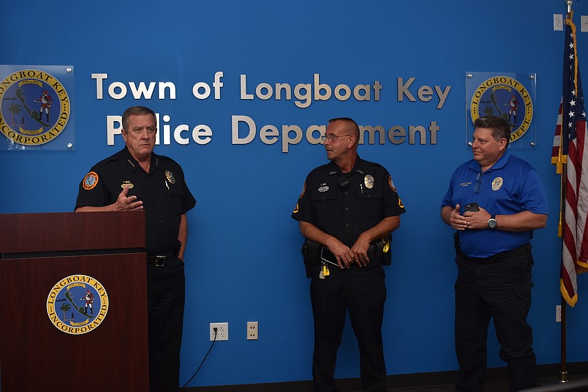 Police chief George Turner speaks highly of Shawn Nagell while Frank Rubino stands by.