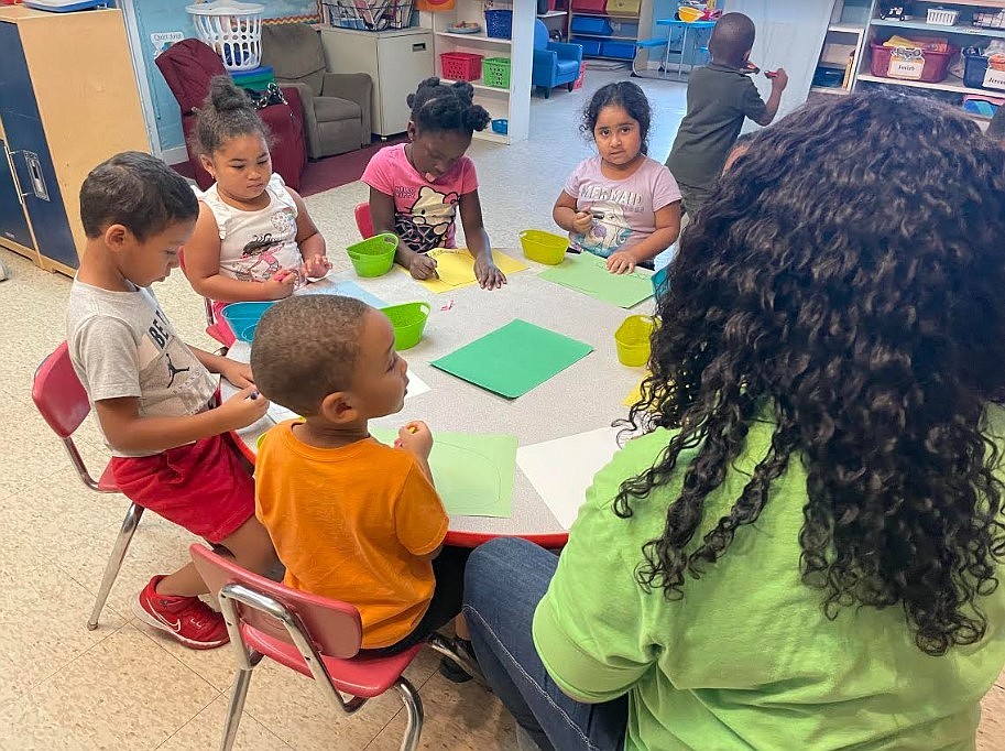 Kimberley Pelham instructs preschool children on drawing a train at Annette's Tender Loving Daycare in Holly Hill. The preschool has a long waiting list of children, but not enough teachers. Courtesy photo