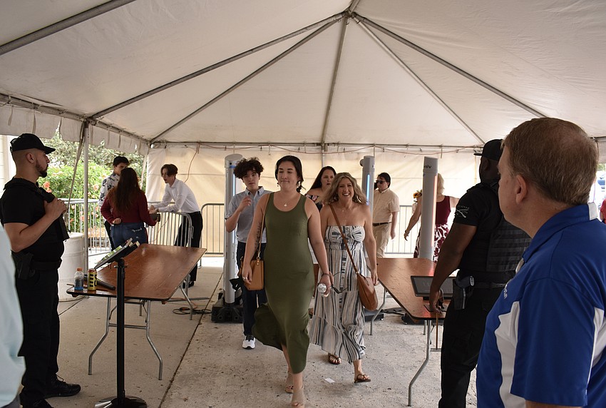 Attendees passed through a security checkpoint before entering Robarts Arena.