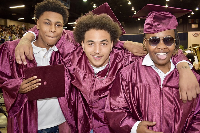 Sheldon Young Jr., Thomas McNear and Devonte Henry enjoy some time before the ceremony.