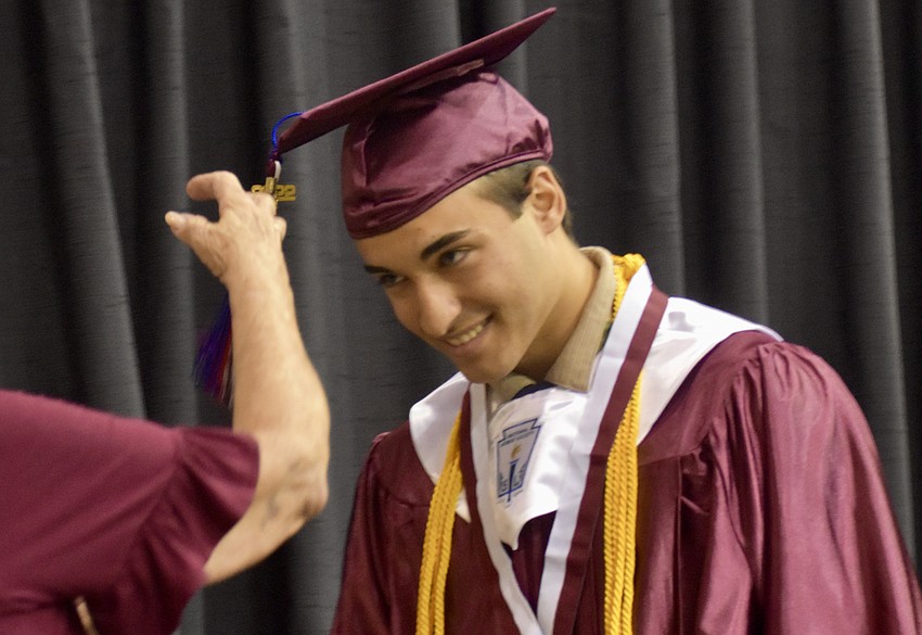 Giovanni Emilio Giacometti has his cap's tassel moved from one side to the other, signifying his graduation.