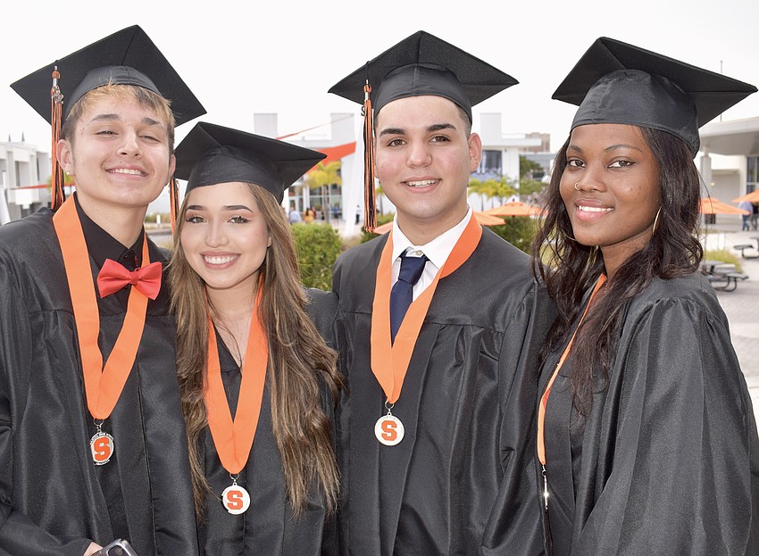 Nico Medina, Joha Mendez, Ronald Guntin and Pamela Gomez are ready to graduate.
