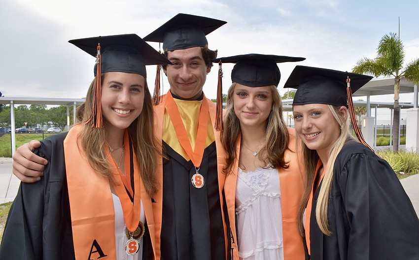 Avery Flocio, Jorge Romero Salgado, Alisa Zheleznyak and Adalia Linville are ready for the ceremony to begin.