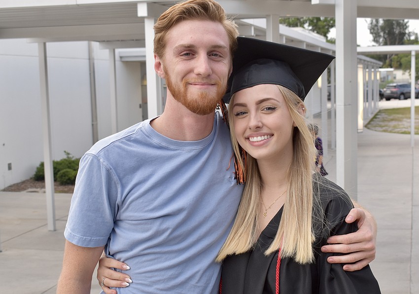Michael Bush and Emily Stuart chat before the ceremony.