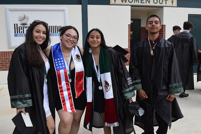 Nicole Vasquez, Zayra Contreras, Wendy Aquino and Esteban Perez-Martinez are proud to graduation. Perez-Martinez is the first in his family to graduate high school.