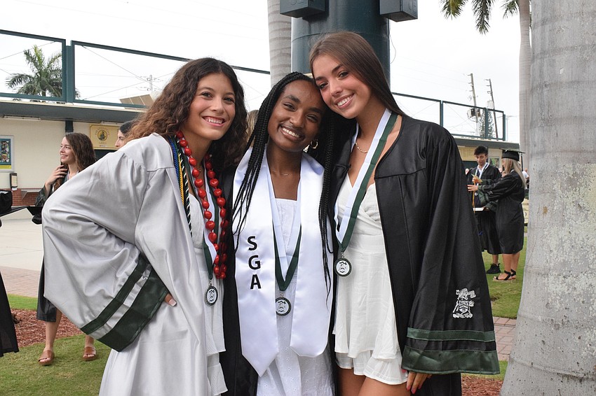 Camilla Sablan, Deedee Tuckerman and Taylor Shortridge can't wait to accept their diplomas and throw their caps in the air.