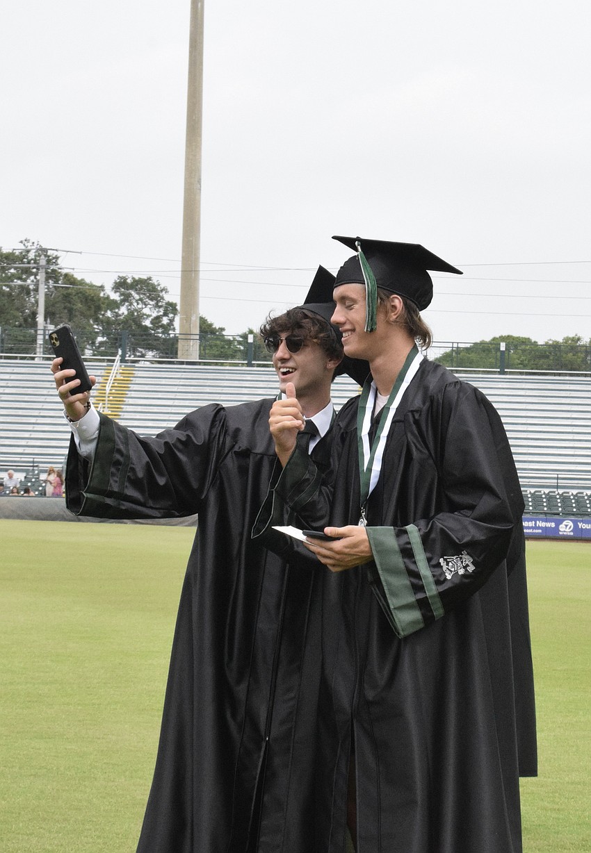 Konstantino Papageorgiou Ayala and Frankie Runge take a selfie.