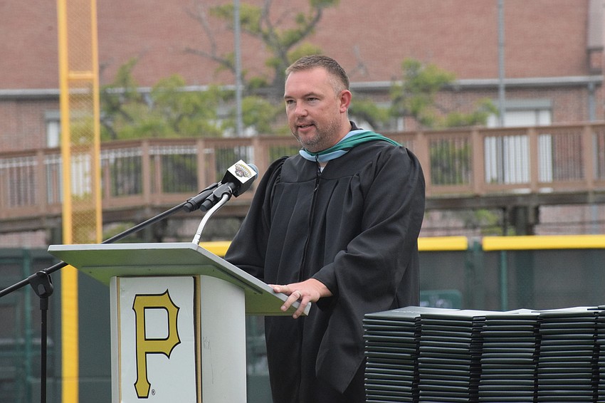 Dustin Dahlquist, the principal of Lakewood Ranch High School, welcomes family and friends to the graduation ceremony.