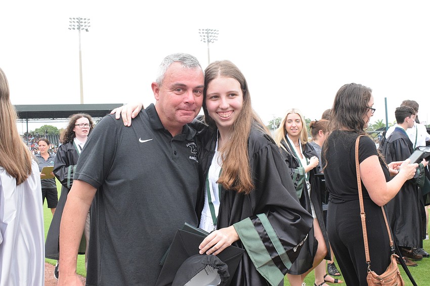 Drex Houston, a Lakewood Ranch High School teacher, says it's bittersweet to see his daughter Kourtlyn Houston graduate.