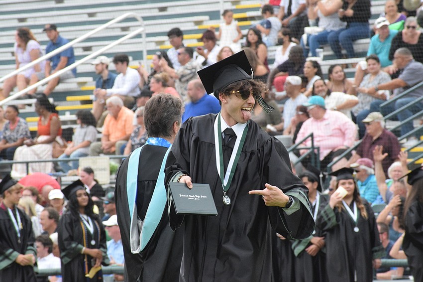Lakewood Ranch High's Konstantino Papageorgiou Ayala shows off his diploma.