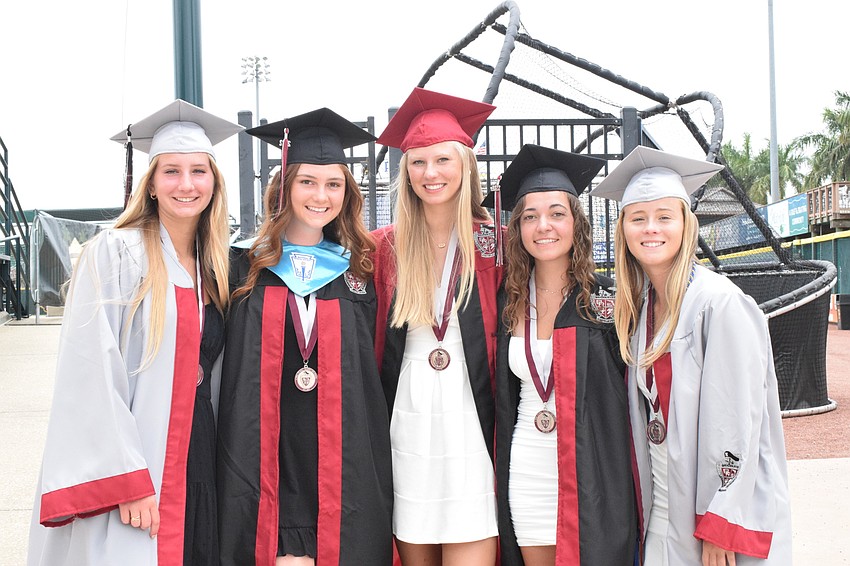 Emily Kopczynski, Emilia Olday, Sierra Arnsperger, Josie Kolbe and Julia DiPasqua enjoy a moment together before the ceremony begins.