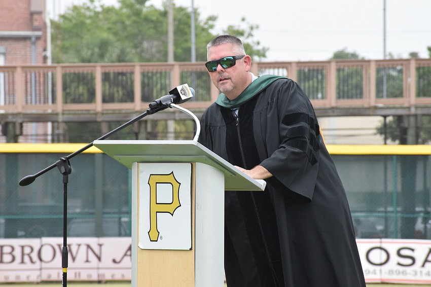 Carl Auckerman, the principal of Braden River High School, welcomes the graduates' friends and families.
