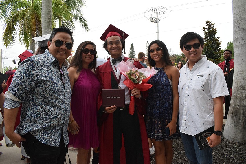 Joe Relao and his wife, Rachel Relao, and his children Breanna Relao and Caleb Relao are proud of Jared Relao (center) for graduating high school.