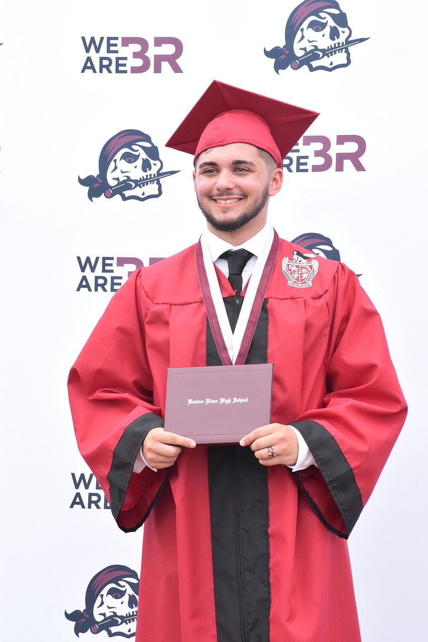 Vasileios Georgiadis shows off his diploma.