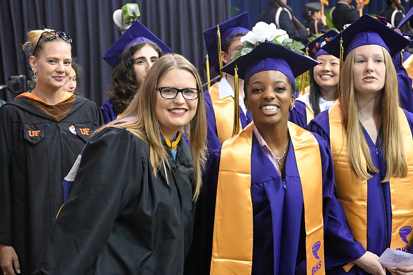 Teacher Ariel Seng and graduate Montana Beacham prior to graduation.