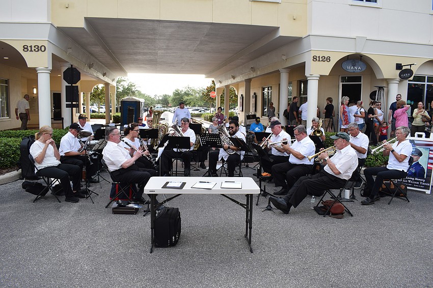 The Lakewood Ranch Wind Ensemble performs before the Tribute to Heroes Parade at Main Street at Lakewood Ranch.
