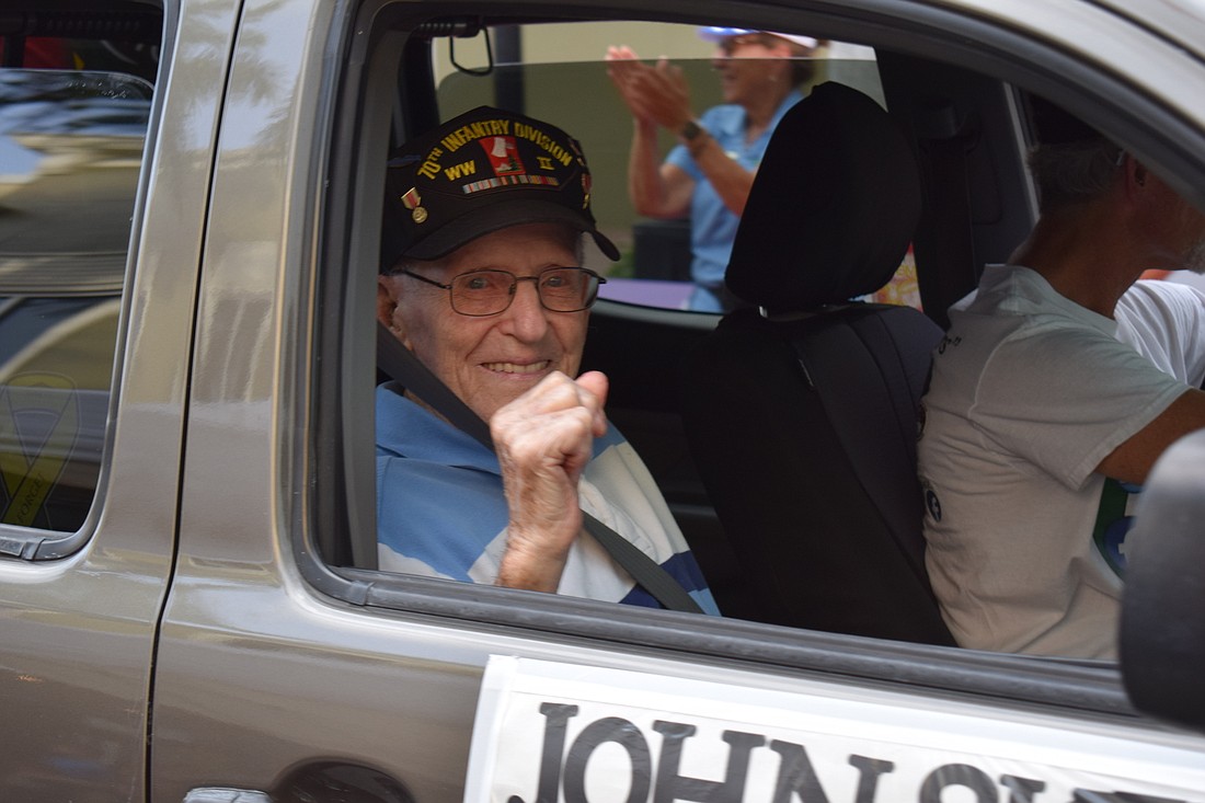 John Skeen, a 103-year-old World War II veteran of the Army's 70th Infantry Division and a bronze star medalist, was honored with a ride at the 2022 Tribute to Heroes Parade.