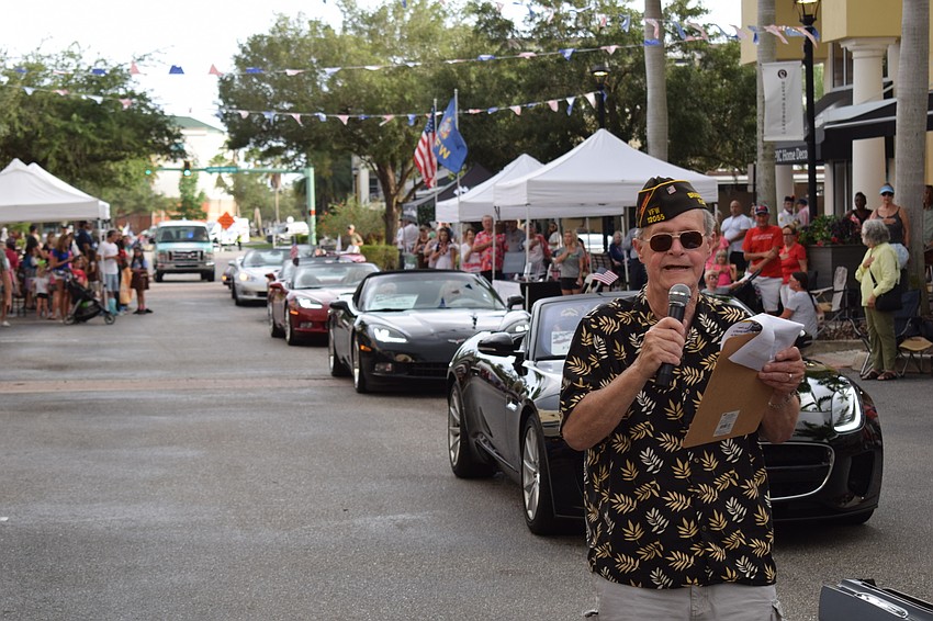 Retired Navy Chaplain Ron Babcock led a procession of veterans by reciting the war poem,  